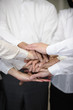 Closeup of a business team with hands together