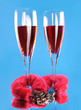 Two wine glasses and love cuffs