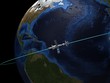 Satellite against the background of the earth