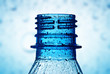 macro of bottle neck with water drops