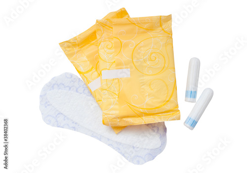 Photo: Tampons and napkins isolated on white background Tampons and napkins isolated on white background