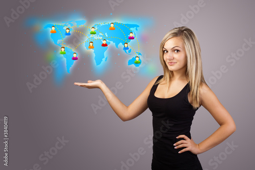 Photo: Young woman holding virtual map Young woman holding virtual map