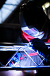 WELDER AT WORK (color toned image; shalow DOF)