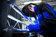 WELDER AT WORK (color toned image; shalow DOF)