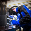 WELDER AT WORK (color toned image; shalow DOF)