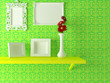 Modern interior composition, yellow shelf with vase and frames o