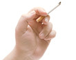 the human hand holding a cigarette the human hand holding a cigarette