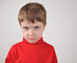 Young Boy Upset with Red Shirt