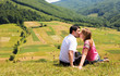 kissing couple in mountain Carpathians
