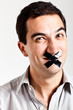 Man struggling to keep quiet