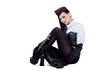 Photo: Sitzende junge Frau in Gothic-Kleidung Sitzende junge Frau in Gothic-Kleidung