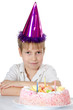 The boy in a cap with a pie