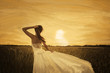 painting of bride in yellow field on sunset