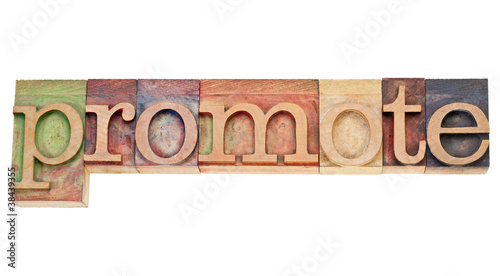 Photo: promote - word in letterpress type promote - word in letterpress type