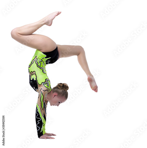 Photo: Young professional gymnast stand on splits Young professional gymnast stand on splits