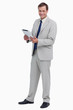 Photo: Smiling businessman with his tablet computer Smiling businessman with his tablet computer