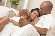Happy African American Man & Woman Couple Embracing