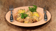 Königsberger Klopse mit Salzkartoffeln und Beilagen
