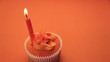 Orange birthday cupcake