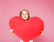 Girl holding paper heart