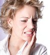 Foto: Young woman in pain is having toothache Young woman in pain is having toothache