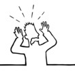 Frightened man with his hands up in the air.