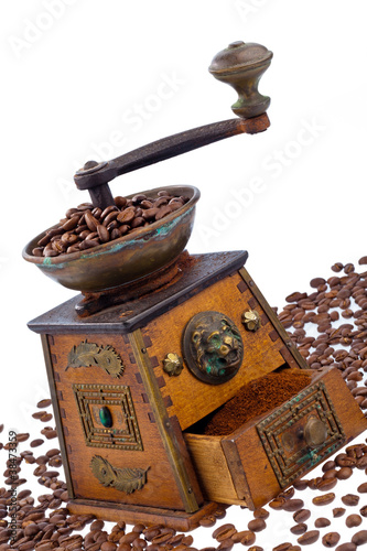 Photo: Kaffee. Kaffeebohnen und Kaffeemühle Kaffee. Kaffeebohnen und Kaffeemühle