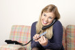 A cheerful woman on the phone A cheerful woman on the phone