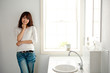 attractive asian woman in the bathroom