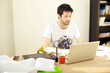 Casual Man Working On Laptop