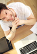Overhead View Smiling Man At Laptop