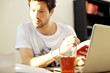 Student Studying With Drink