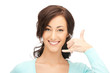 woman making a call me gesture