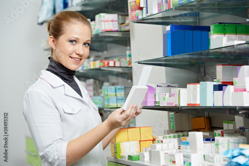 Photo: Pharmacy chemist women in drugstore Pharmacy chemist women in drugstore