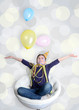 Kind mit Luftballons