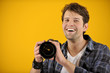 happy photographer with SLR camera