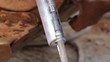 Pneumatic Grease Gun Cylinder Moving Under Pressure Pneumatic Grease Gun Cylinder Moving Under Pressure