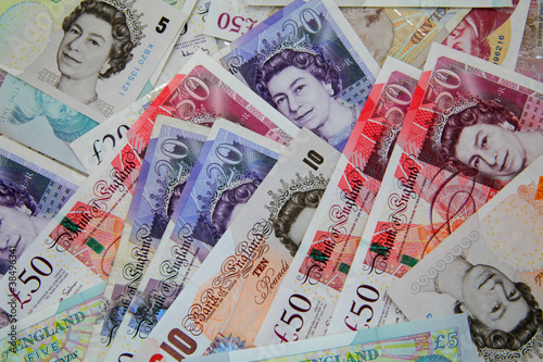 Photo: pile of used sterling notes pile of used sterling notes