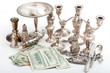 gold and silver pile scrap and cash dollar