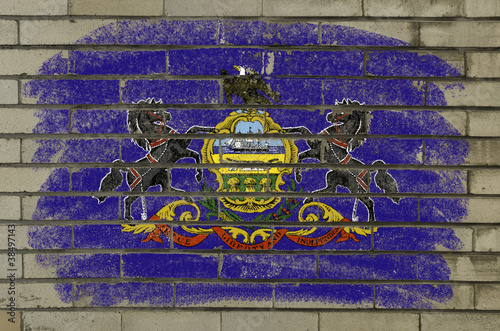 Illustration: grunge flag of US state of pennsylvania on brick wall painted wi grunge flag of US state of pennsylvania on brick wall painted wi