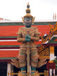 Giant guardian in the Temple of the Emerald Buddha, Bangkok.
