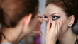 Model making-up for photography in studio.