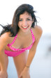 lovely bikini model on windy pier in key west florida