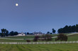 Moon over horse farm