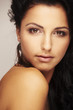 beautiful brunett model in studio on light background