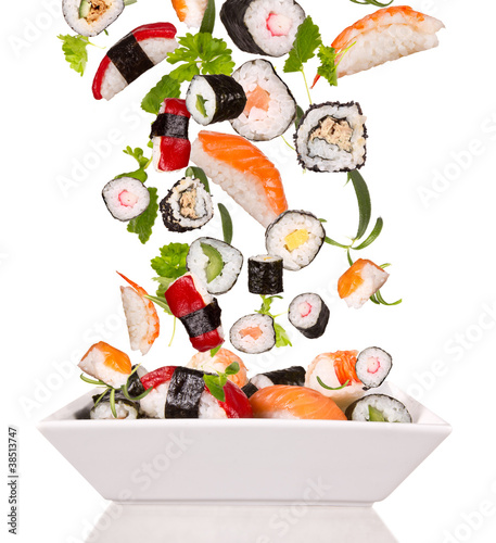 Photo: Delicious pieces of sushi, isolated on white background Delicious pieces of sushi, isolated on white background