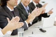 business people applauding
