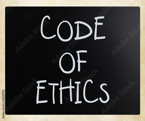 Illustration: "Code of ethics" handwritten with white chalk on a blackboard "Code of ethics" handwritten with white chalk on a blackboard