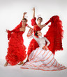 Three young women dancing flamenco Three young women dancing flamenco