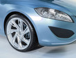 Foto: Wheel and lamp of car. Wheel and lamp of car.